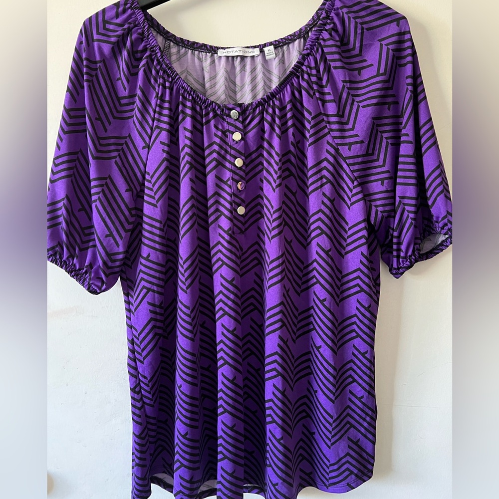 Beautiful purple blouse. Black and purple design.